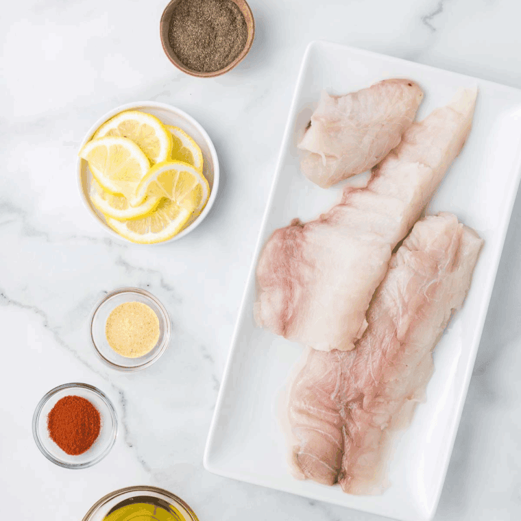 Ingredients needed for air fryer monkfish recipe on kitchen table.