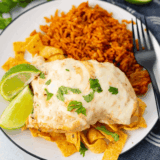Homemade Applebee’s Fiesta Lime Chicken topped with cheese and zesty ranch-lime sauce.