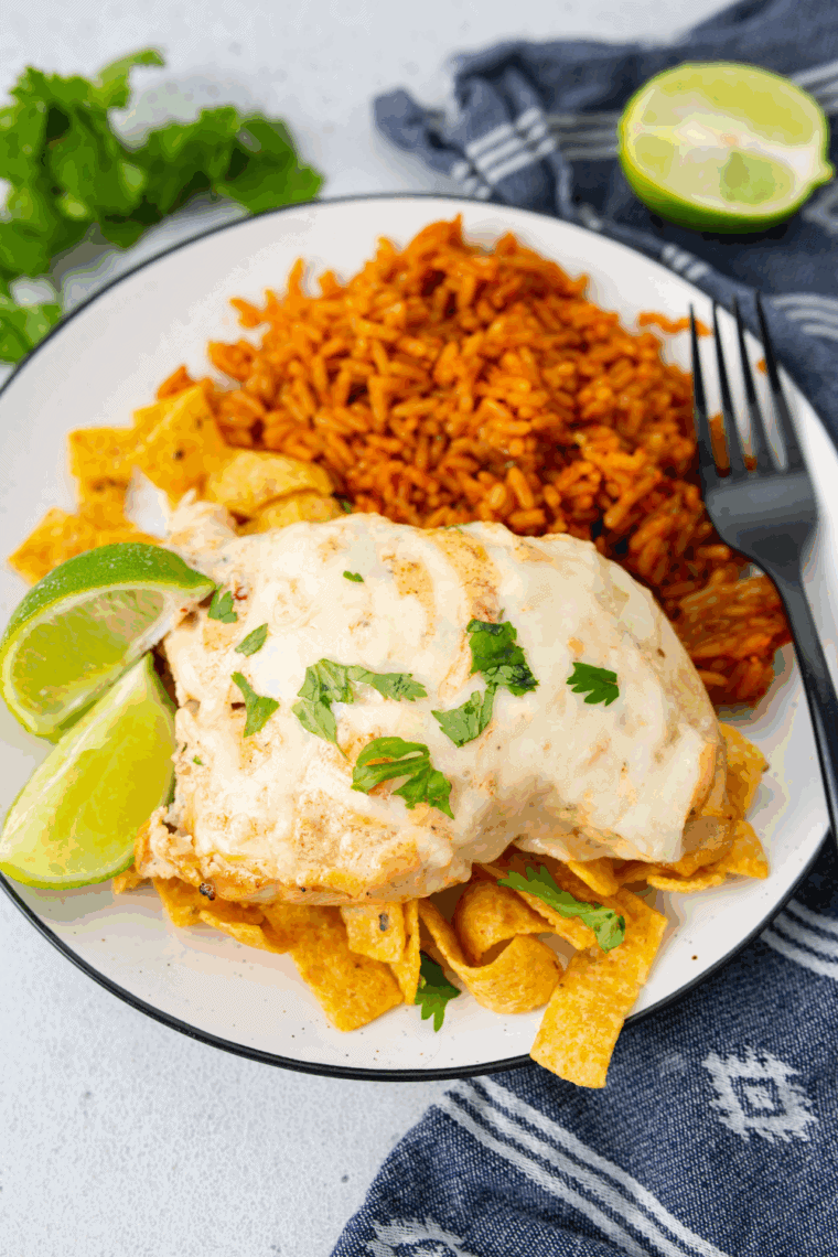 Homemade Applebee’s Fiesta Lime Chicken topped with cheese and zesty ranch-lime sauce.