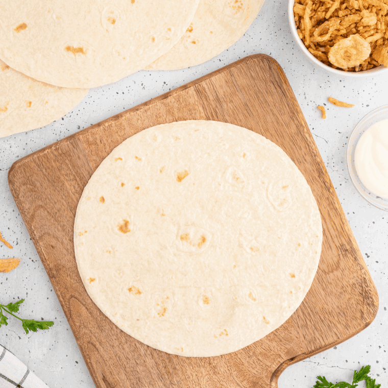 Warming tortillas in the microwave with a damp paper towel.