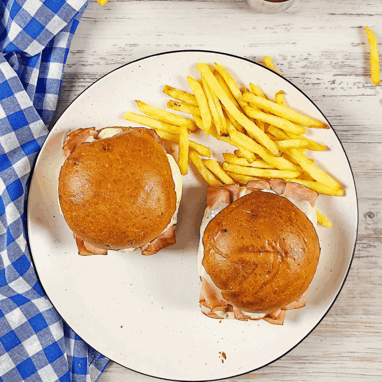 Homemade Arby’s Ham and Cheese Melt in air fryer with golden toasted bun and melted cheese.