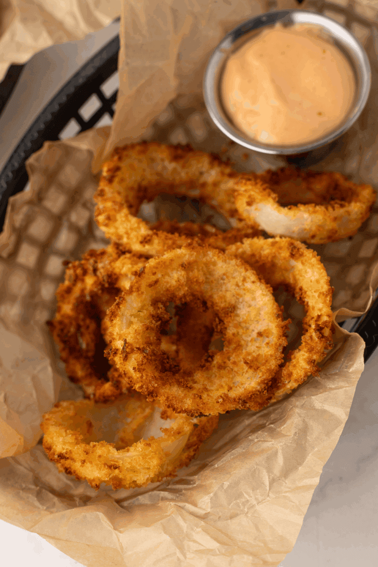 Homemade Burger King Zesty Sauce served with crispy golden onion rings.