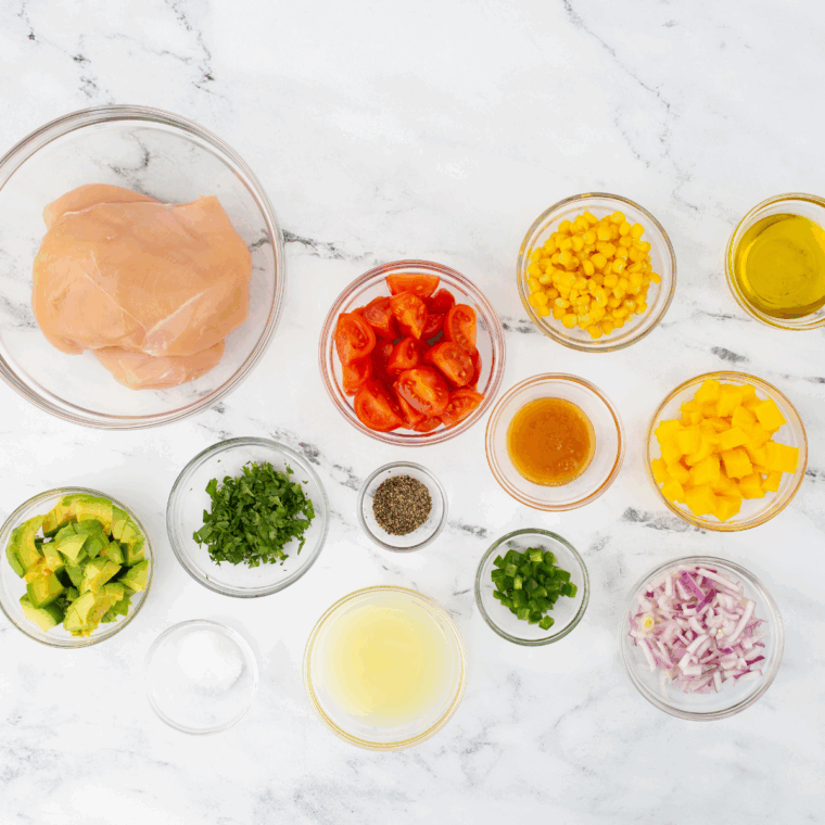 Ingredients needed for Cilantro Lime Jalapeño Vinaigrette on kitchen table.
