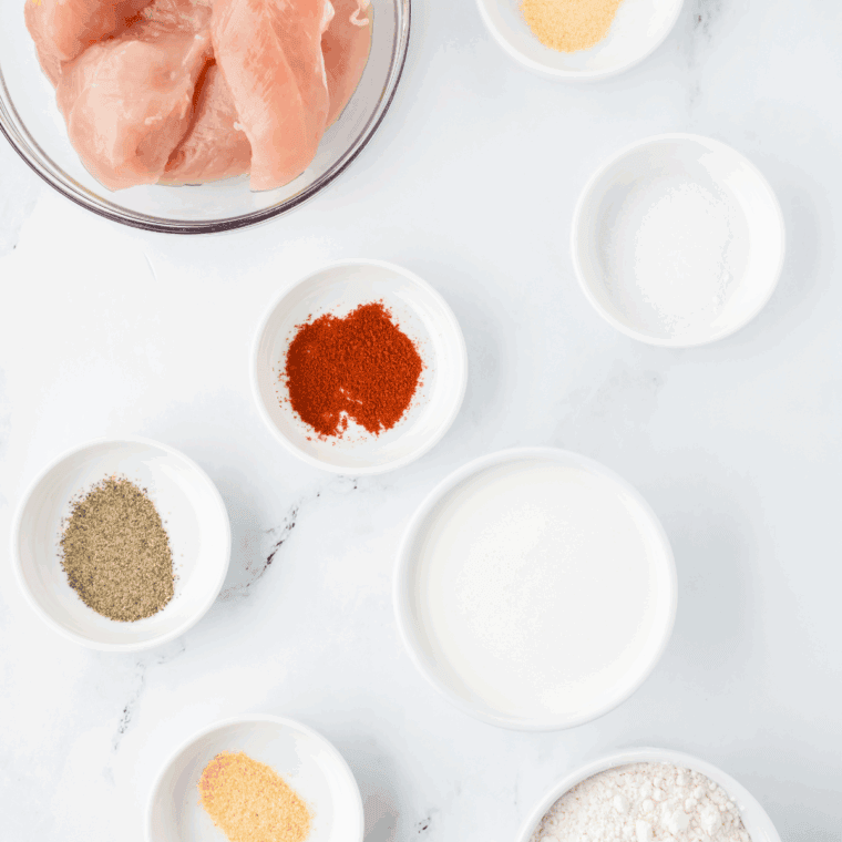 Ingredients needed for Copycat Applebee’s Chicken Tenders on kitchen table.
