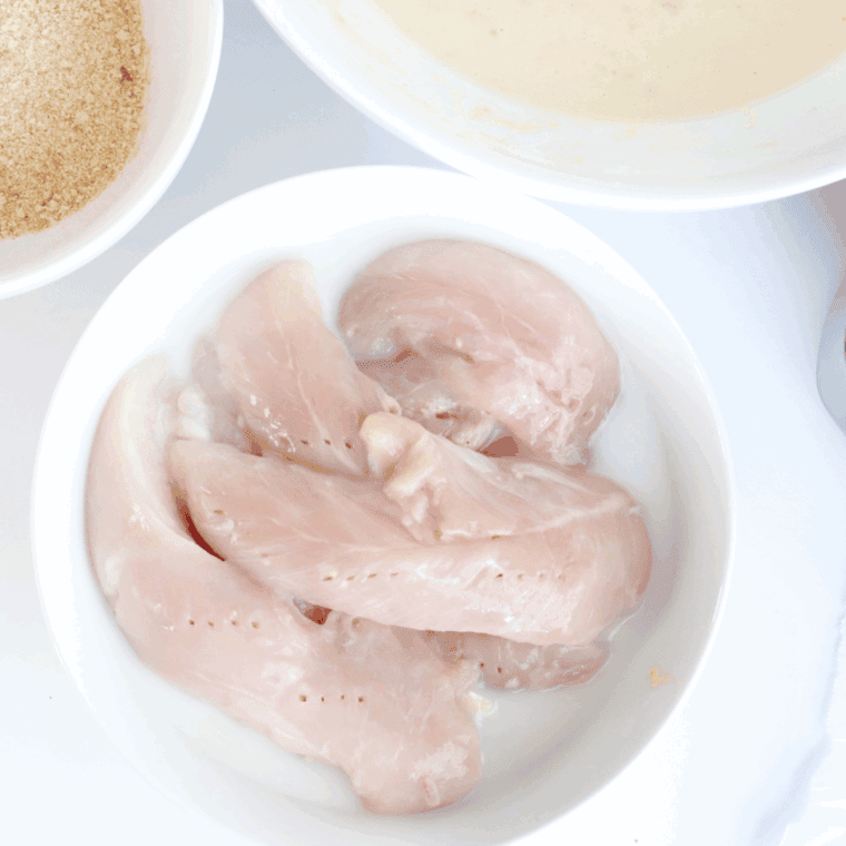 Soak the chicken tenders into the buttermilk.
