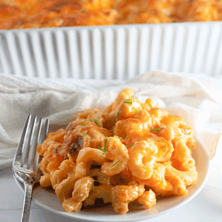 Creamy homemade Arby’s-style mac and cheese in a white bowl.