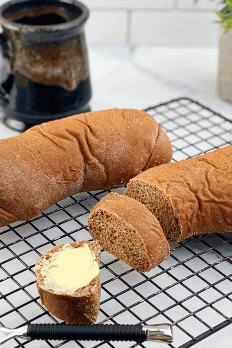Homemade Cheesecake Factory brown bread copycat topped with rolled oats.