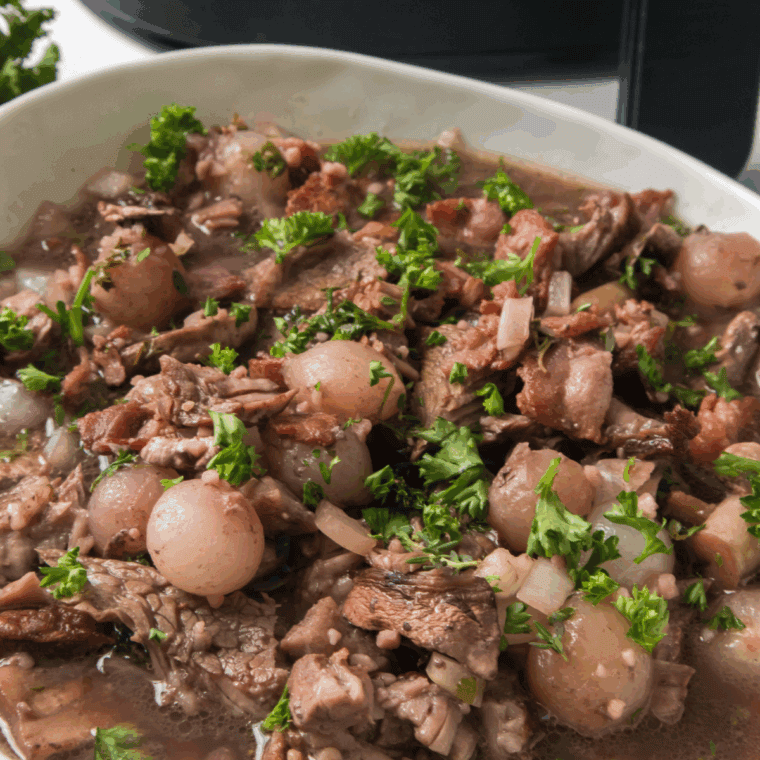 Tender copycat Golden Corral pot roast served with carrots and potatoes on a plate