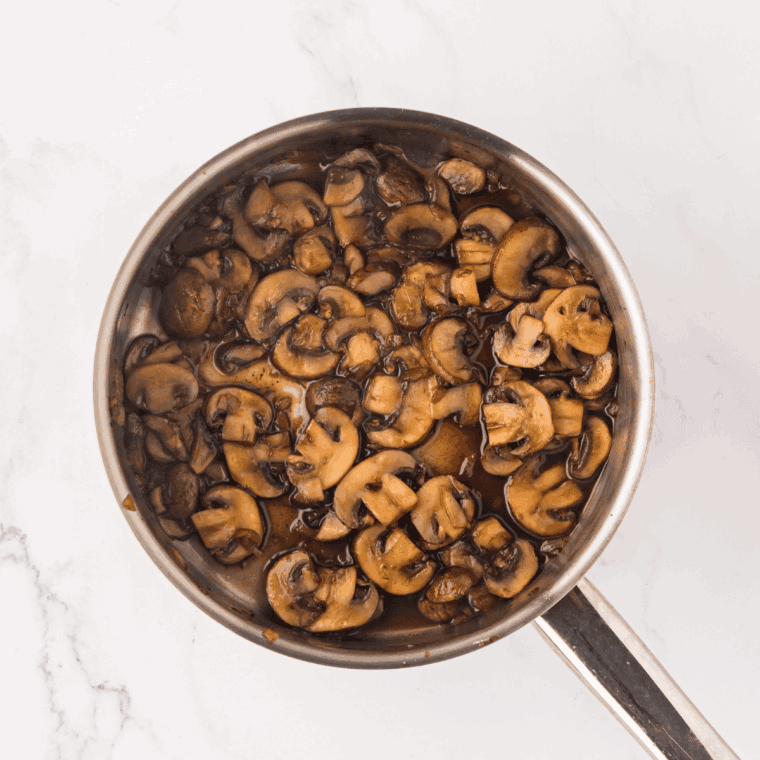 Sauting the mushrooms in a small saucepan, until tender and golden brown.