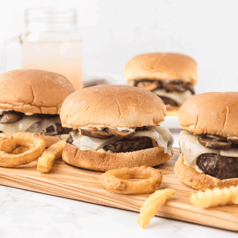 Cooked Copycat Hardee’s Mushroom Swiss Burger Recipe on kitchen table.