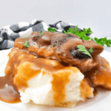 Tender pork chops smothered in brown gravy cooked in the crockpot.