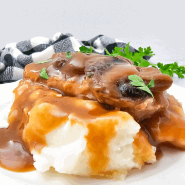 Tender pork chops smothered in brown gravy cooked in the crockpot.