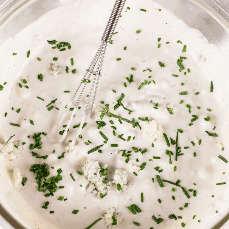 Add all of the ingredients in the mixing bowl of Domino's Blue Cheese Dressing Recipe.