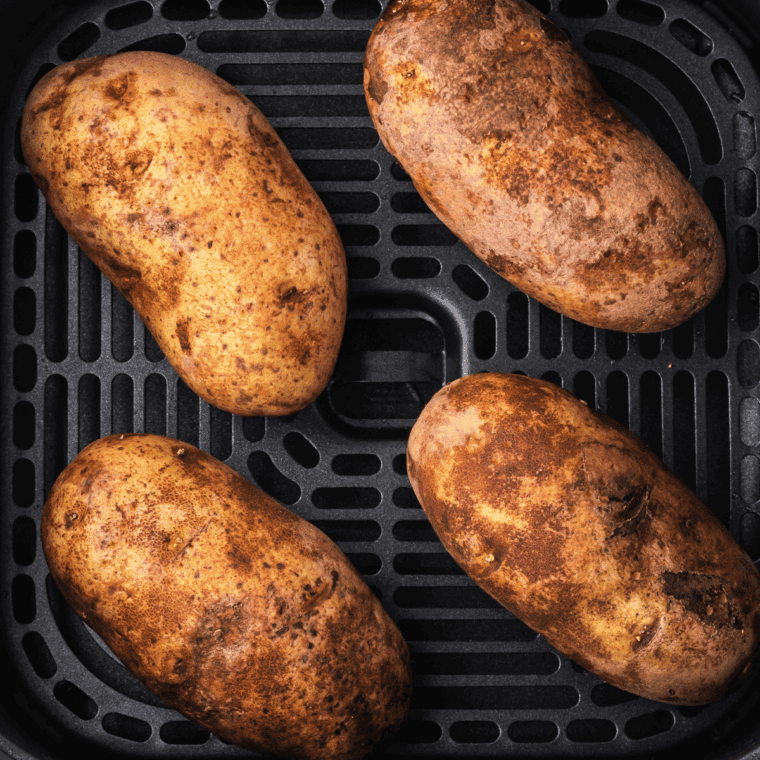 Cooking potatoes in the oven on a baking sheet.
