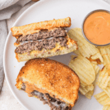 Make the iconic Hardee’s Frisco Burger at home with this easy copycat recipe—featuring crispy sourdough bread, melty Swiss and American cheese, and a perfectly grilled beef patty.