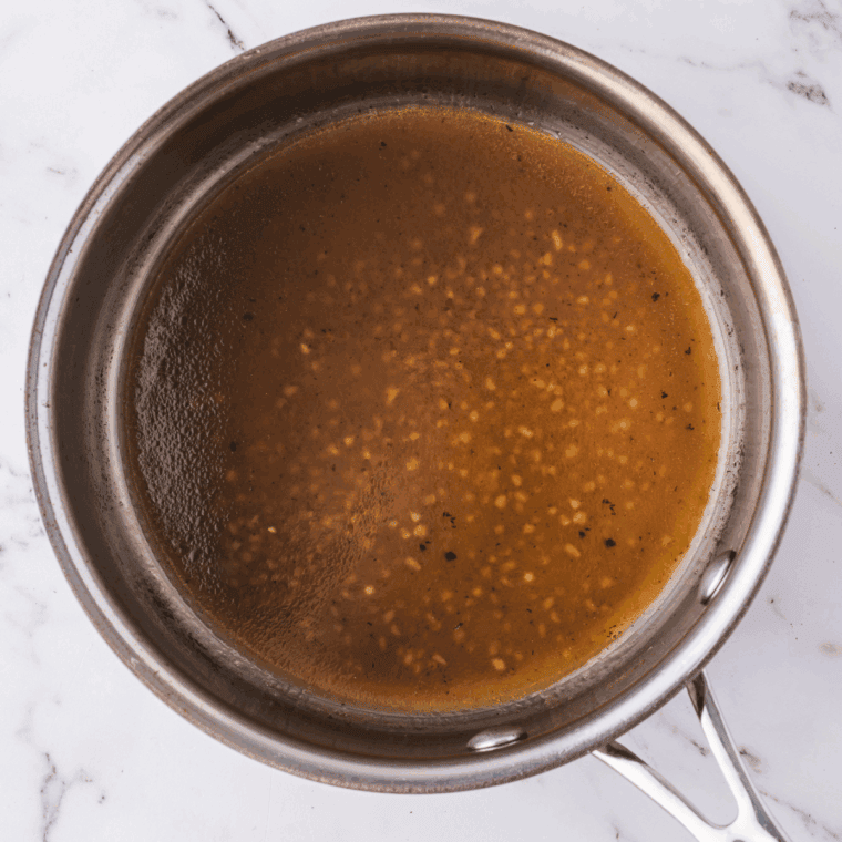 Cook KFC gravy in a pot.