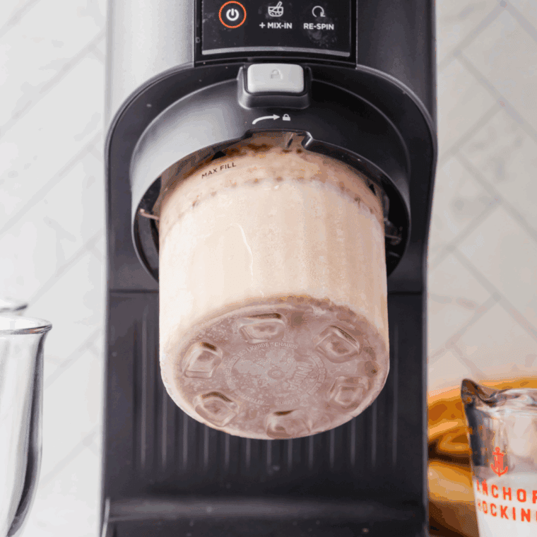 Place the Ninja Creami Copycat McDonald’s Frappe Recipe into the machine.