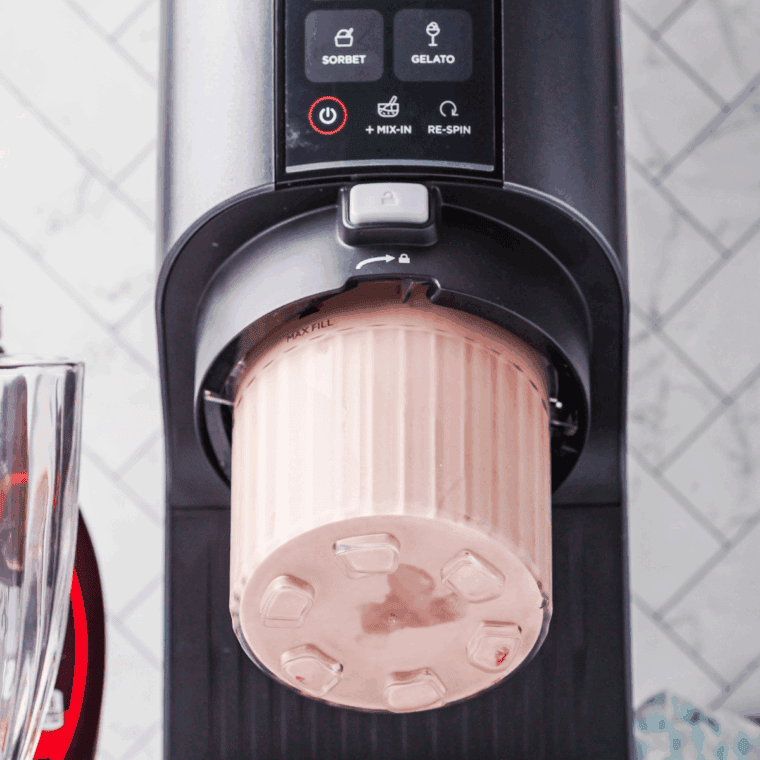 Ninja Creami mixing ingredients into a smooth and creamy mocha shake.