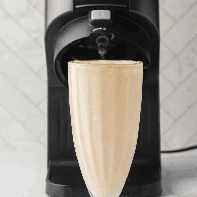 Ninja Creami McDonald's vanilla milkshake served in a glass with a straw.