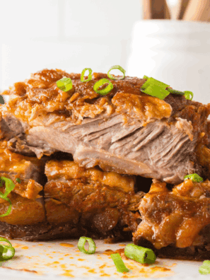A homemade sauce full of traditional ingredients such as mirin, gochujang sauce, and minced ginger among others, is poured over pork ribs to create these bright, bold Korean BBQ ribs.