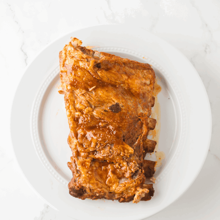 place the sauce over the ribs.