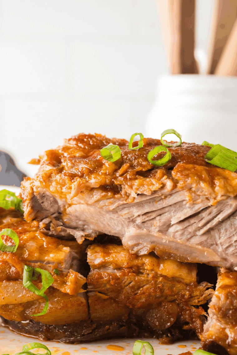 Plate of Ninja Foodi Korean BBQ Ribs on kitchen table.