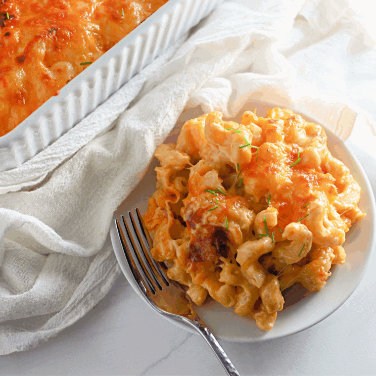 Plate of Old-Fashioned Baked Macaroni and Cheese on tablecloth.