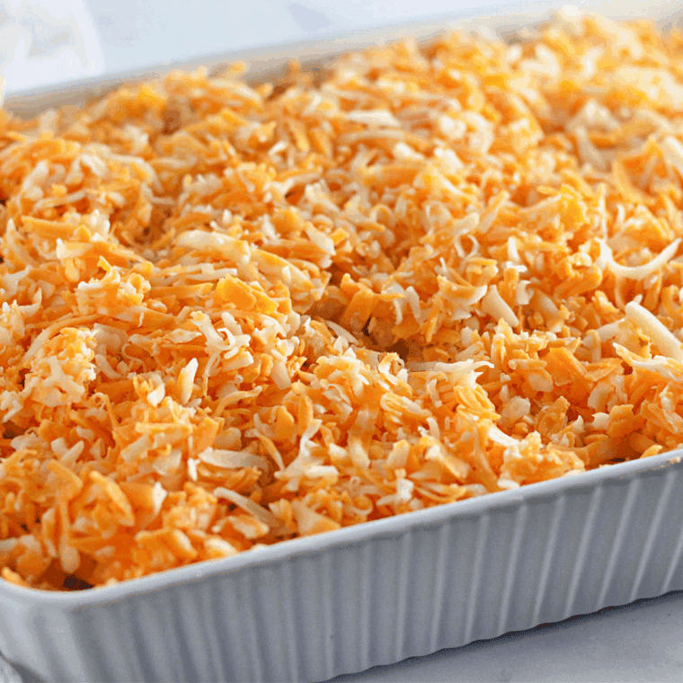Uncooked Old-Fashioned Baked Macaroni and Cheese in casserole dish.