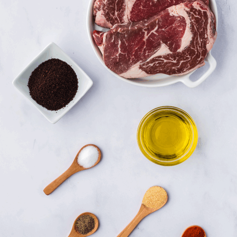 Ingredients needed for Outback Steak Seasoning on kitchen table.
