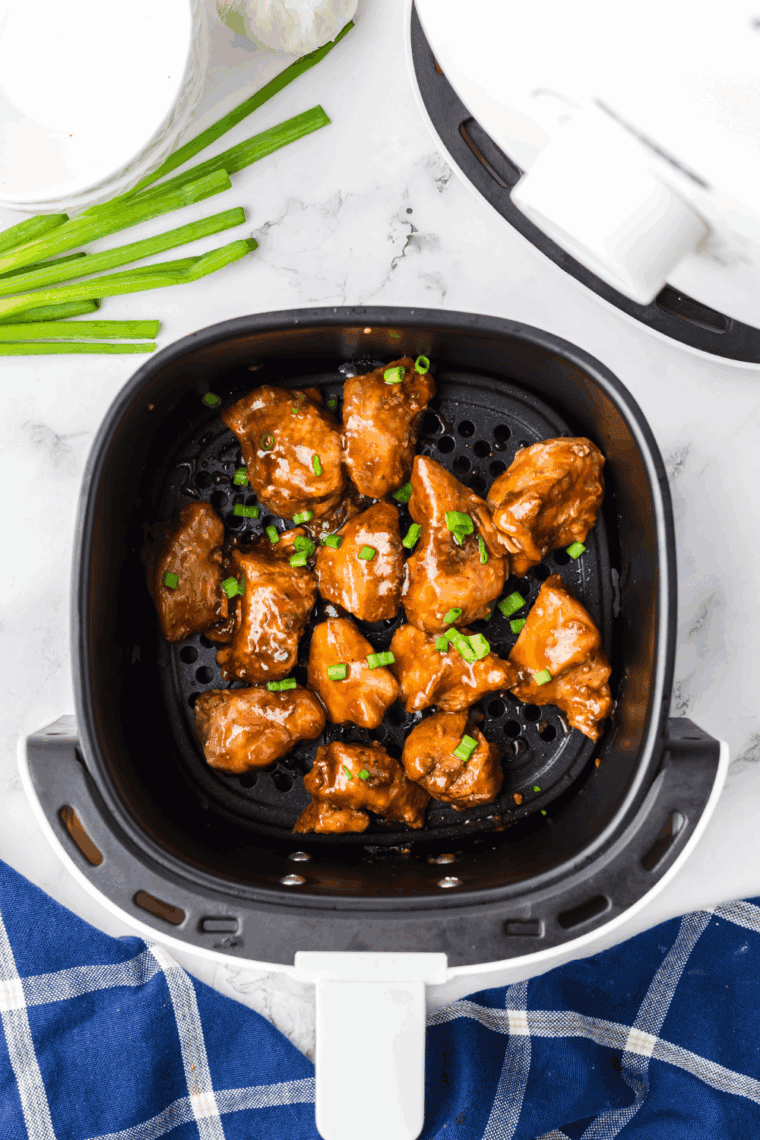 Cooked Panda Express’s Grilled Teriyaki Chicken Recipe in the air fryer basket.
