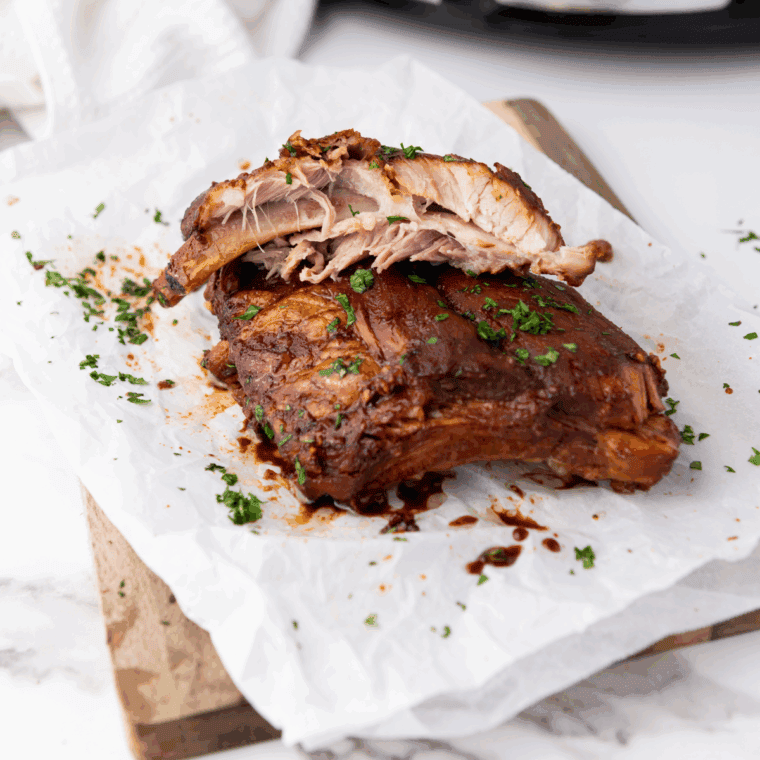 Slow Cooker Dr. Pepper Ribs simmering in BBQ sauce and soda for a tender, flavorful dinner.
