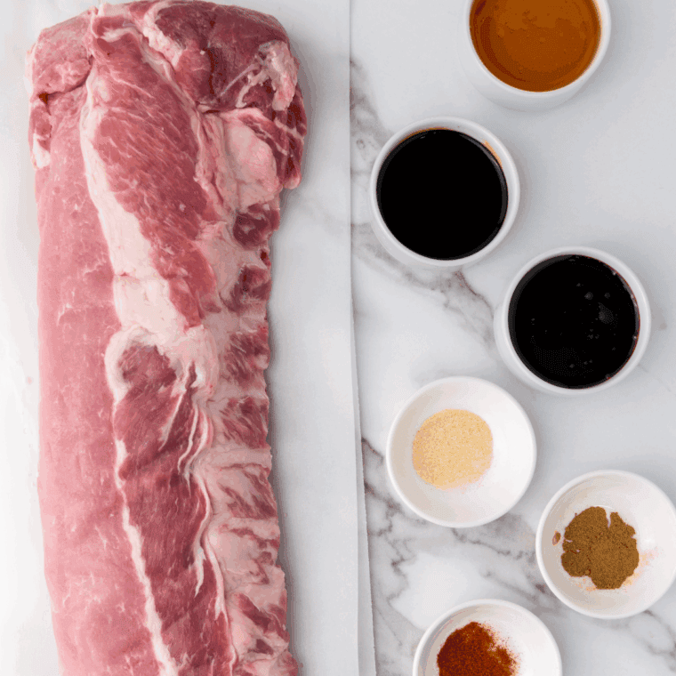 Ingredients needed for Slow Cooker Dr. Pepper Ribs on kitchen table.