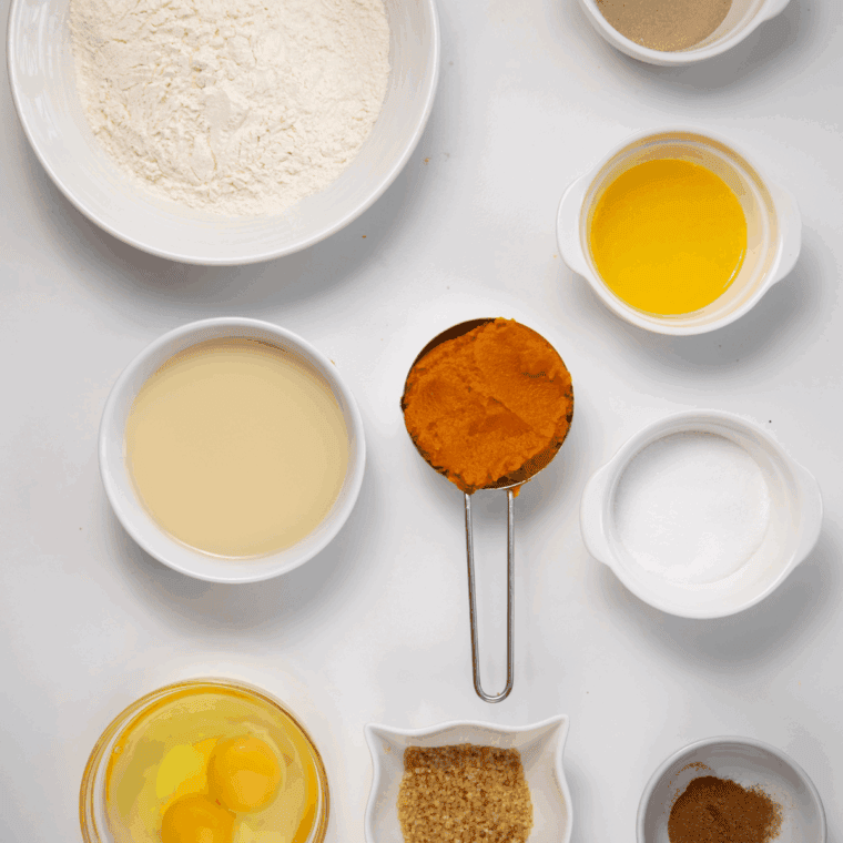 Ingredients needed for Sourdough Pumpkin Cinnamon Rolls Recipe on kitchen table.
