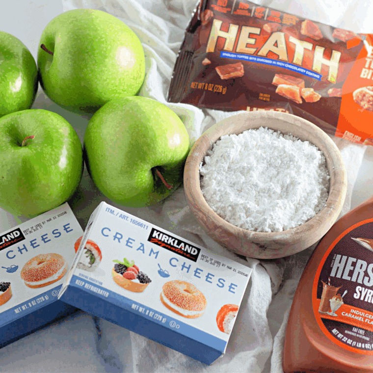 Toffee apples dip in the kitchen table the ingredients needed.