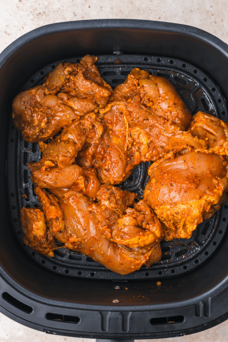 Cook Trader Joe’s Shawarma Chicken Thighs until golden and fully cooked, then rest and slice for serving.