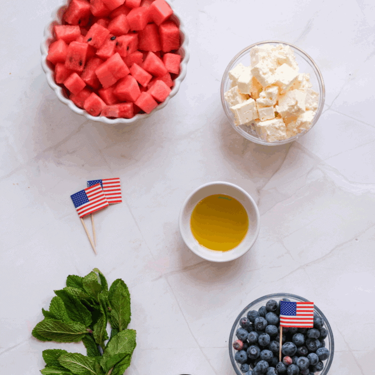Ingredients needed for Watermelon Salad with Feta on kitchen table.