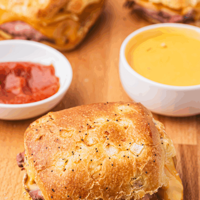 Homemade Arby’s Cheddar Cheese Sauce in a saucepan, rich, creamy, and perfect for dipping or drizzling.