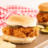 Homemade Arthur Treacher’s Chicken Sandwich with crispy fried fillet, lettuce, and tartar sauce on a toasted bun.