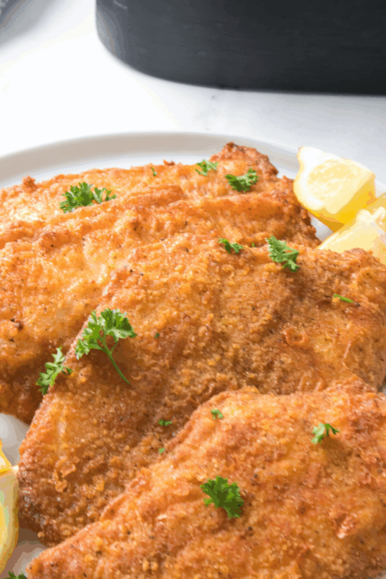 Golden, crispy Captain D’s copycat catfish fillets served with lemon wedges and tartar sauce.