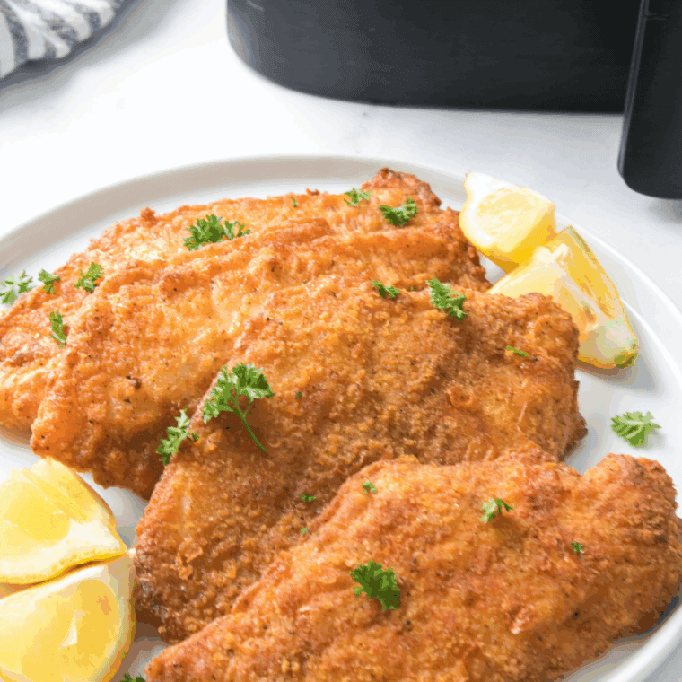 Golden, crispy Captain D’s copycat catfish fillets served with lemon wedges and tartar sauce.