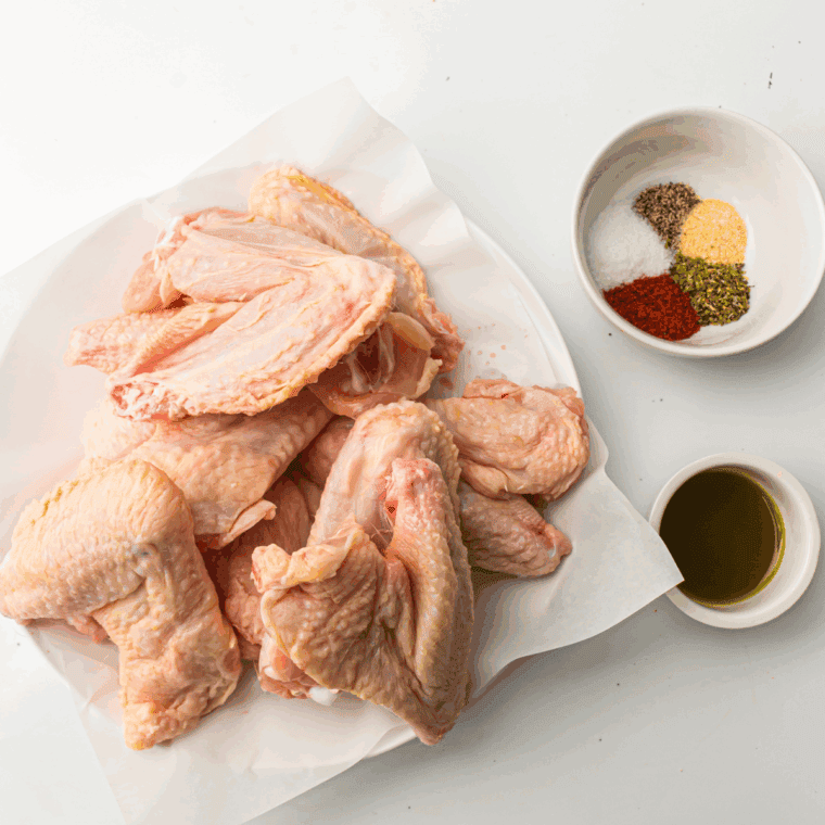 Ingredients needed for Copycat LongHorn Steakhouse Wing Recipe on kitchen table.