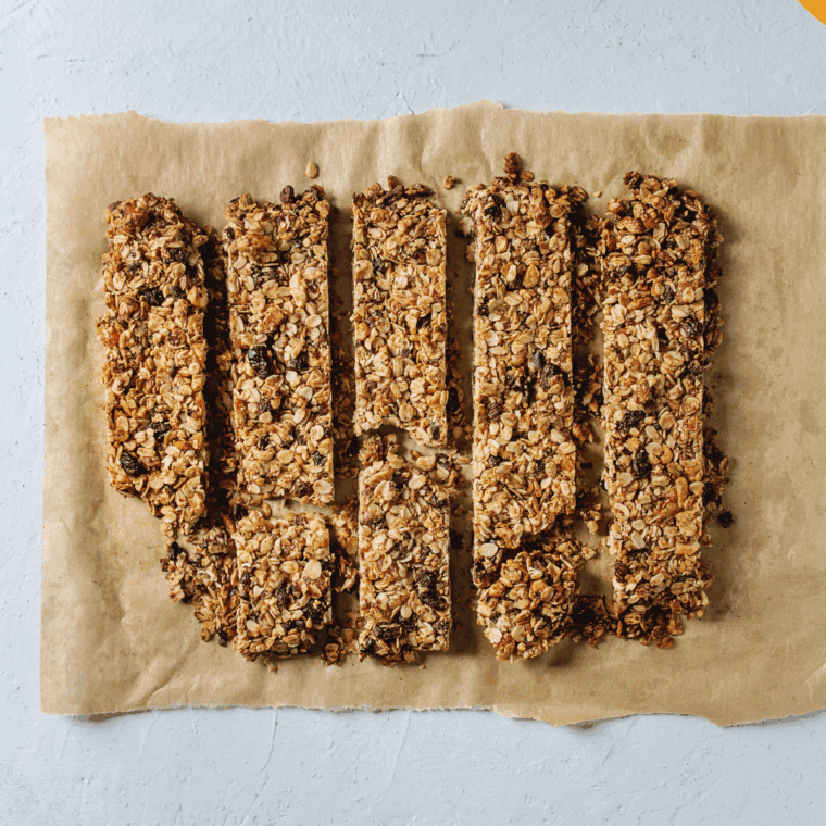 Homemade Copycat Quaker Chewy Chocolate Chip Granola Bars with chocolate chips on top.