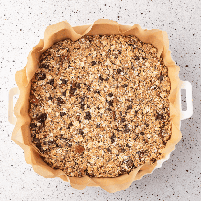 Copycat Quaker Chewy Chocolate Chip Granola Bars into the baking pan.