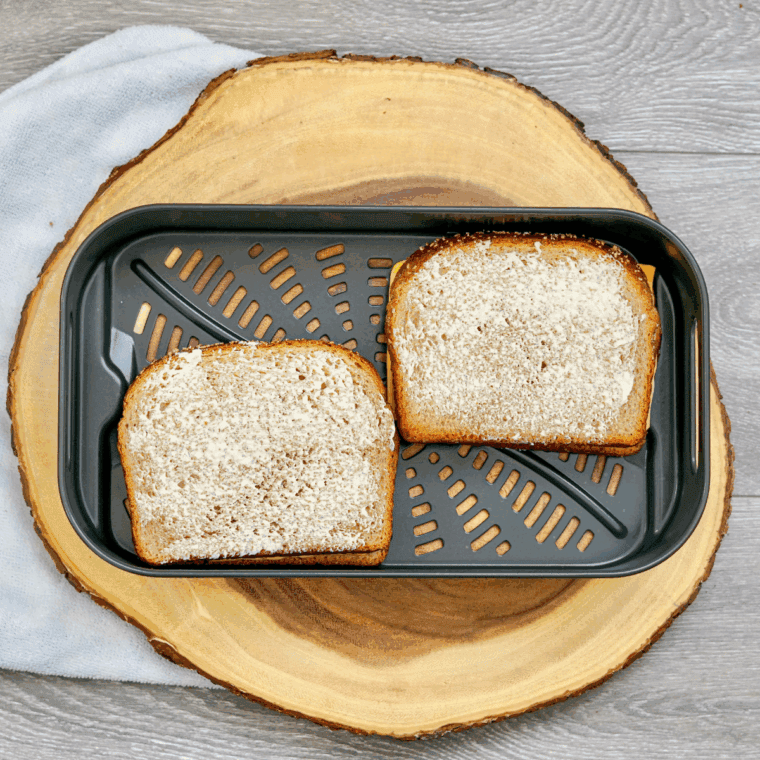 Disneyland-style grilled cheese sandwich with melted cheese and toasted golden bread.