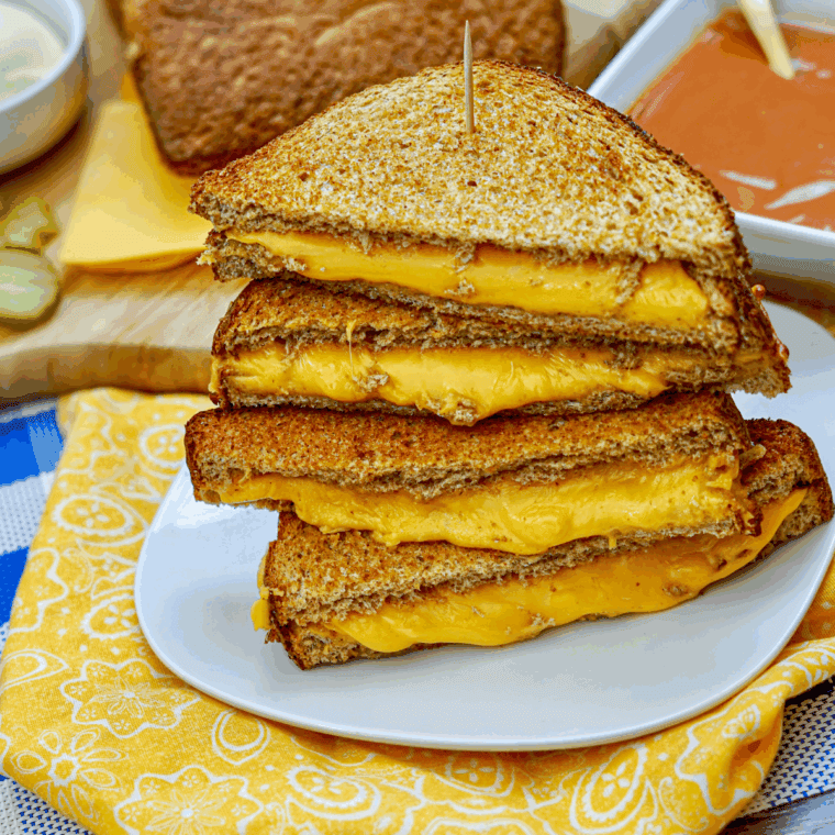 Homemade Disneyland-style grilled cheese sandwich with melted cheese and golden toasted bread.