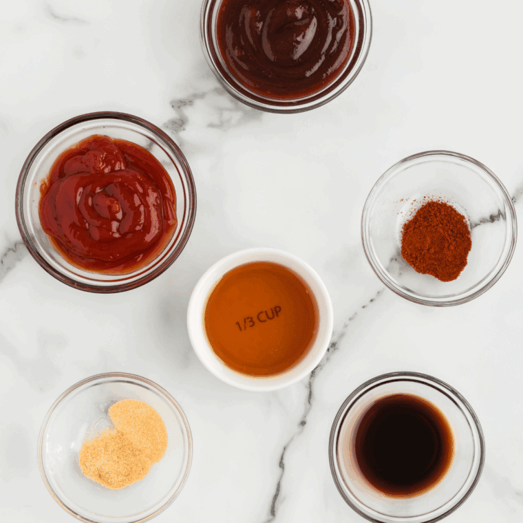 Ingredients for Hooters Daytona wing sauce labeled on a marble counter