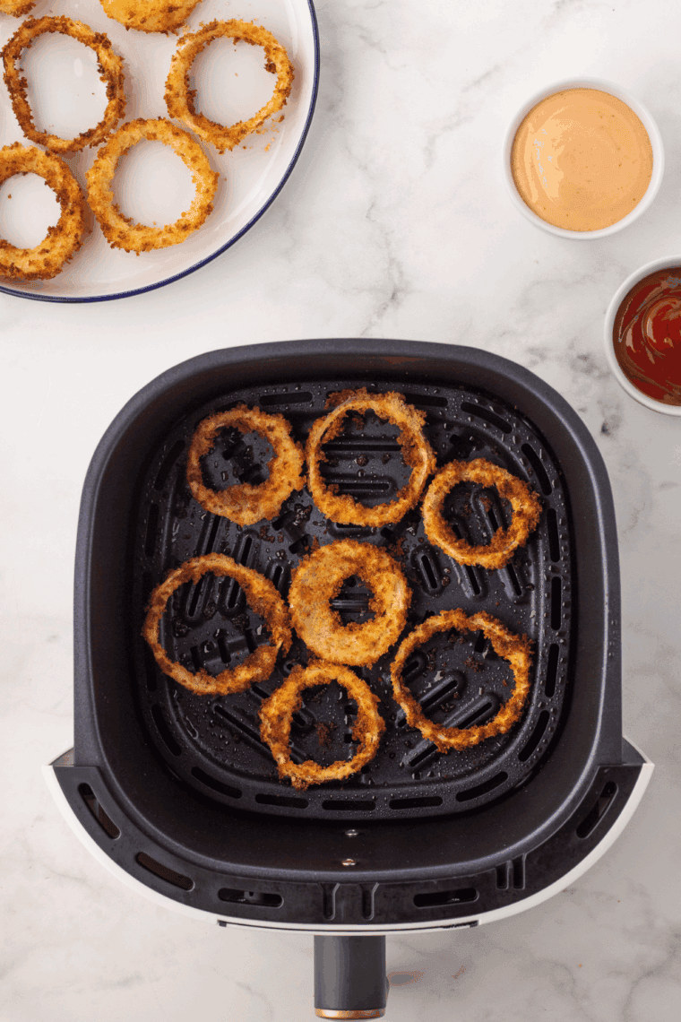 Plate of Hooters Onion Rings Recipe with dipping sauce.