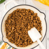 Homemade Jack in the Box taco meat in skillet with seasonings