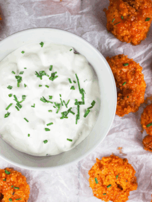 Homemade LongHorn Steakhouse-style blue cheese dressing in a bowl with fresh herbs
