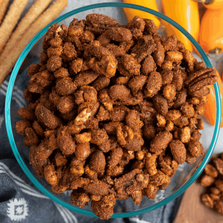 Close-up of almonds, cashews, walnuts, pistachios, and pecans in a bowl